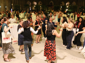 Conference participants dancing at the townhall reception