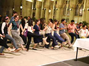 Conference participants dancing at the townhall reception
