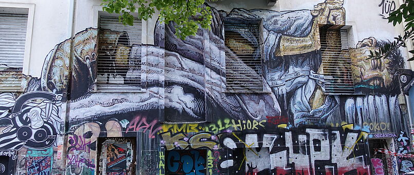 big size street art over security blinds