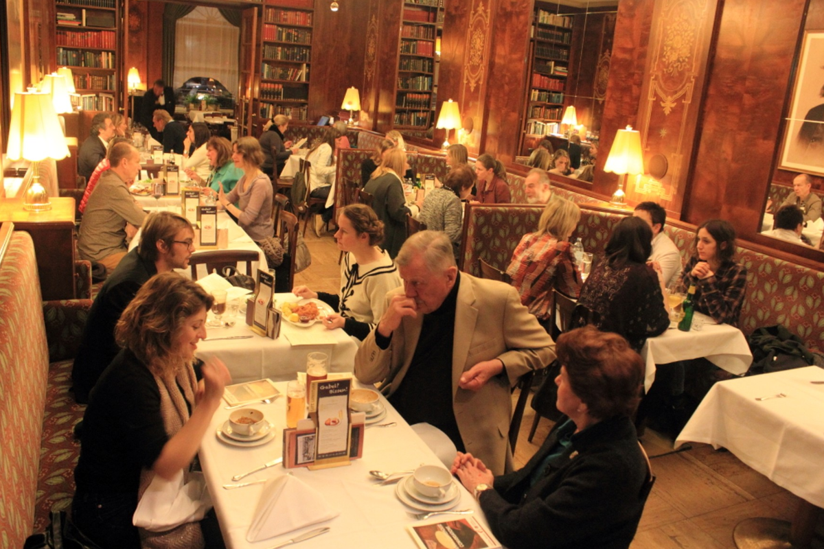 Photo of people sitting in a restaurant