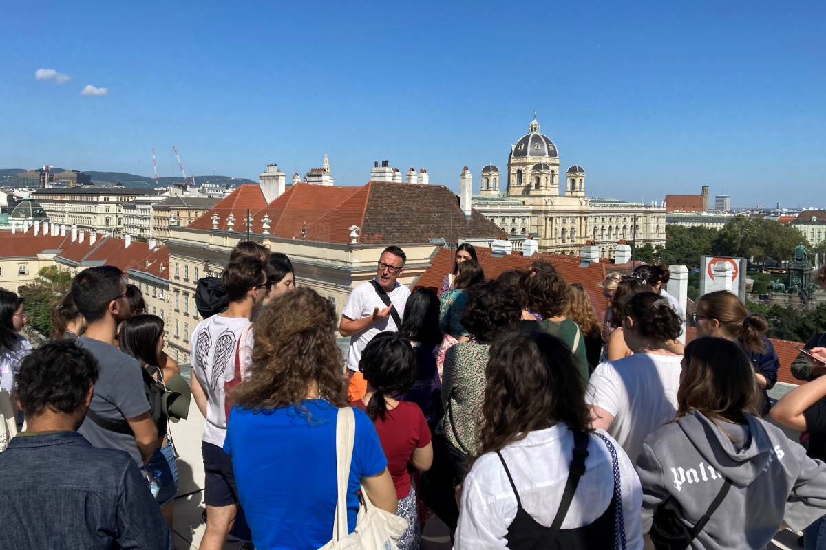 Excursion in Vienna. People on a rooftop